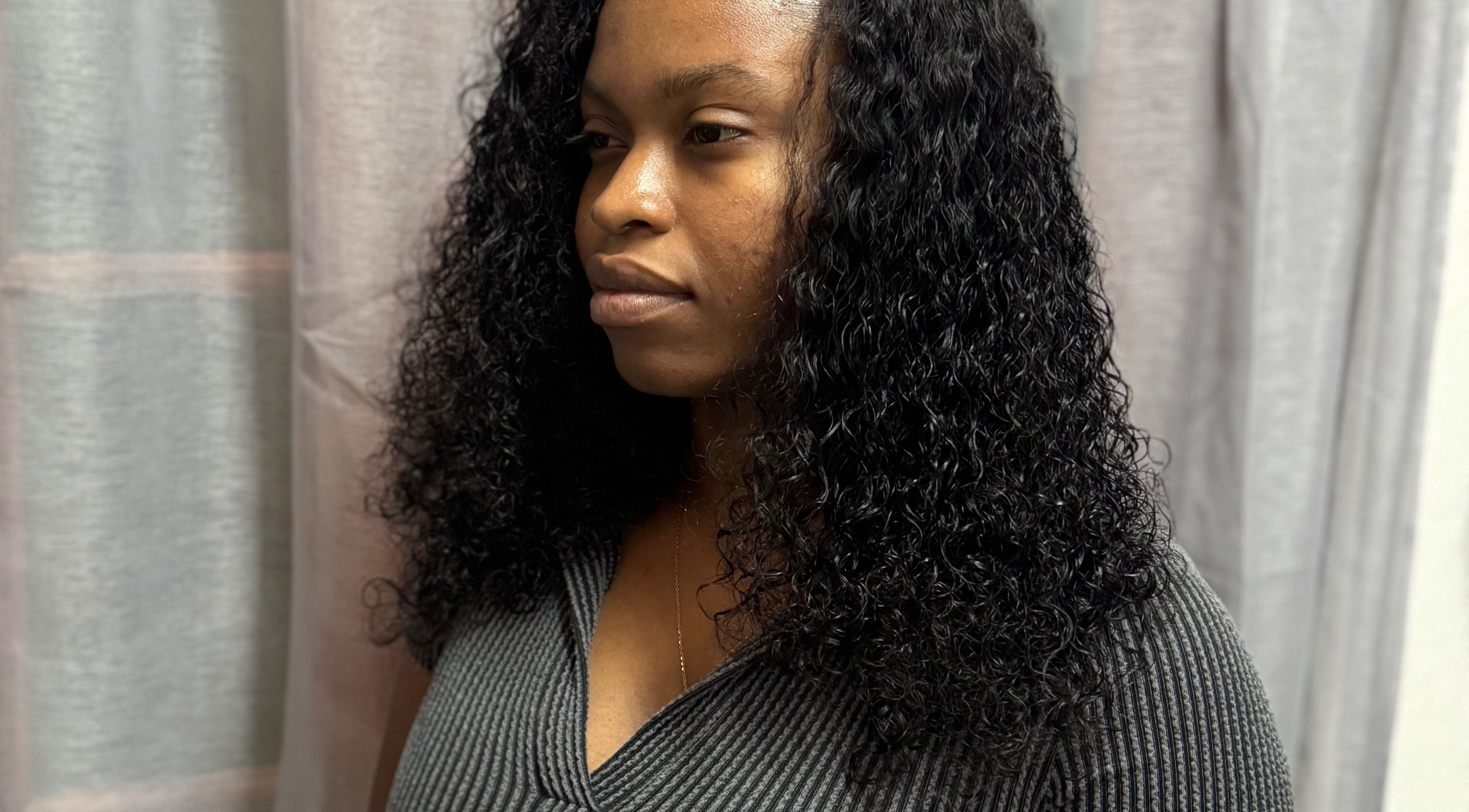 Beautiful curly hairstyle at Fro and Glo Beauty in Bridgetown, Saint Michael, BB.
