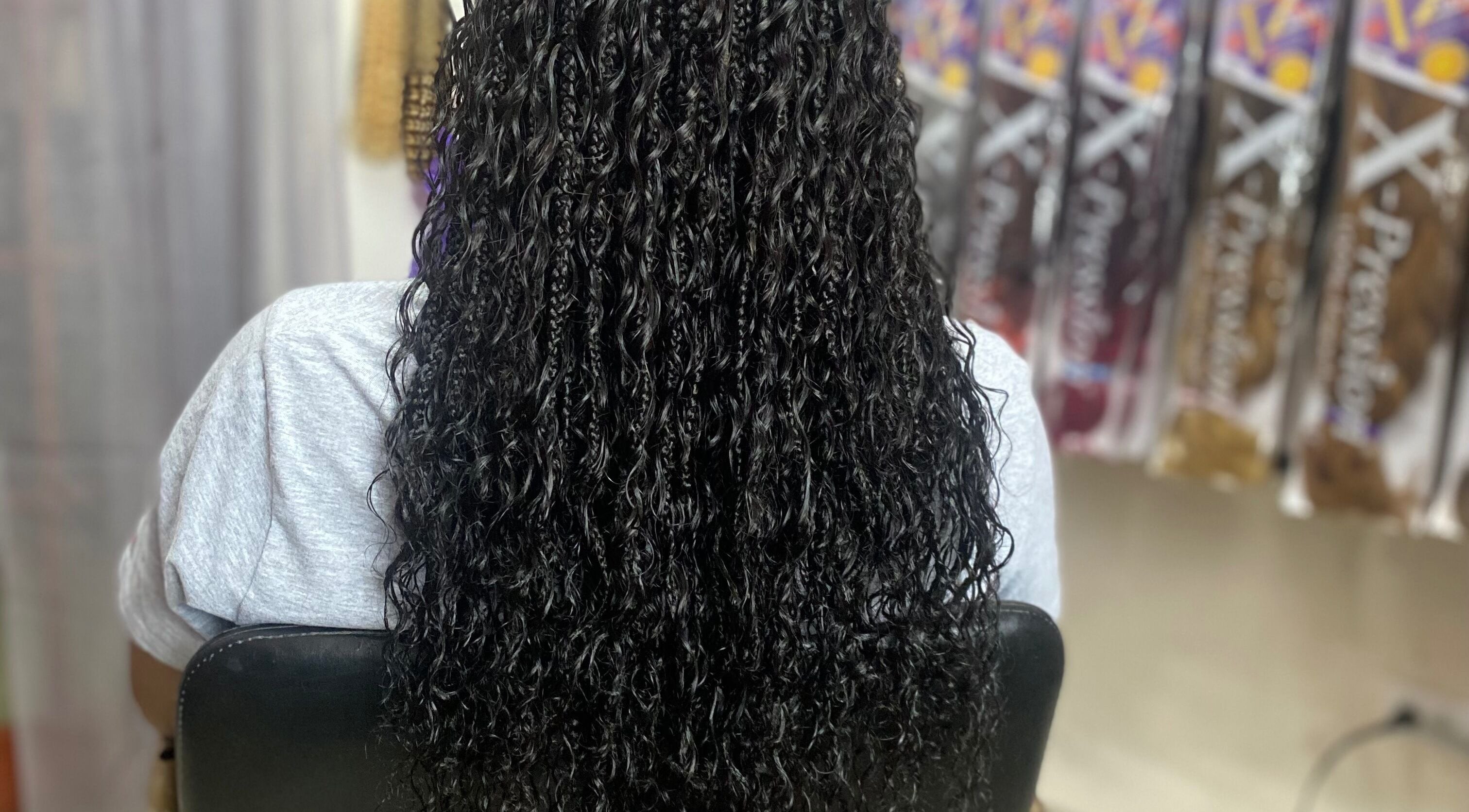 Intricate braids and curls at Fro and Glo Beauty, Bridgetown, Saint Michael, BB showcase stunning hairstyling.