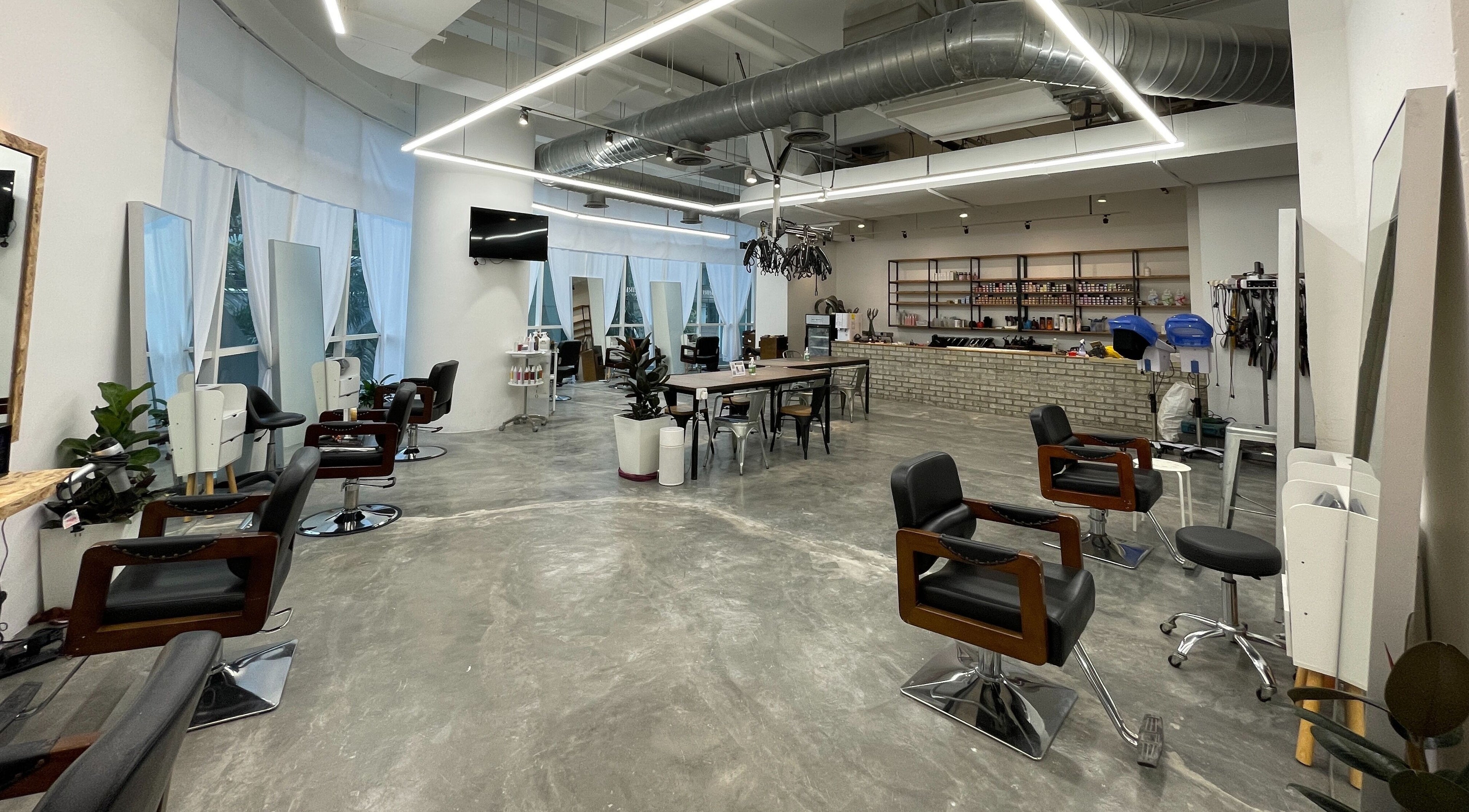 Interior of La FIORERE Korean Hair Salon 1 Mont kiara in Kuala Lumpur. Modern chairs and styling stations.