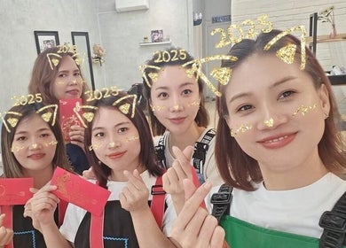 Stylists at La FIORIRE Korean Hair Salon Kota Damansara, Petaling Jaya, Selangor, MY, posing happily together.