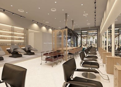 Elegant interior of La FIORIRE Korean Hair Salon PAVILION Bukit Jalil, Kuala Lumpur, featuring modern styling chairs.