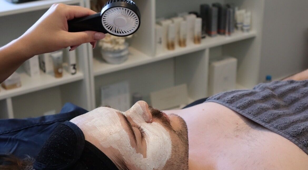 Facial treatment at Skinlibrium, Canning Vale, Western Australia, AU, showcasing relaxation and skincare expertise.