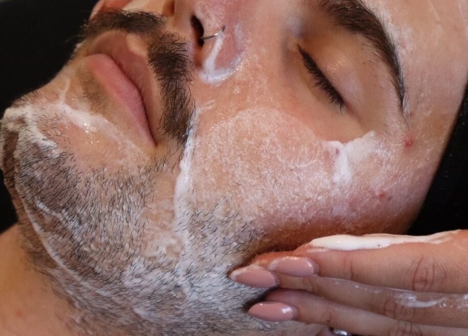Relaxing facial massage for men's skincare at Skinlibrium, Canning Vale, Western Australia, AU.
