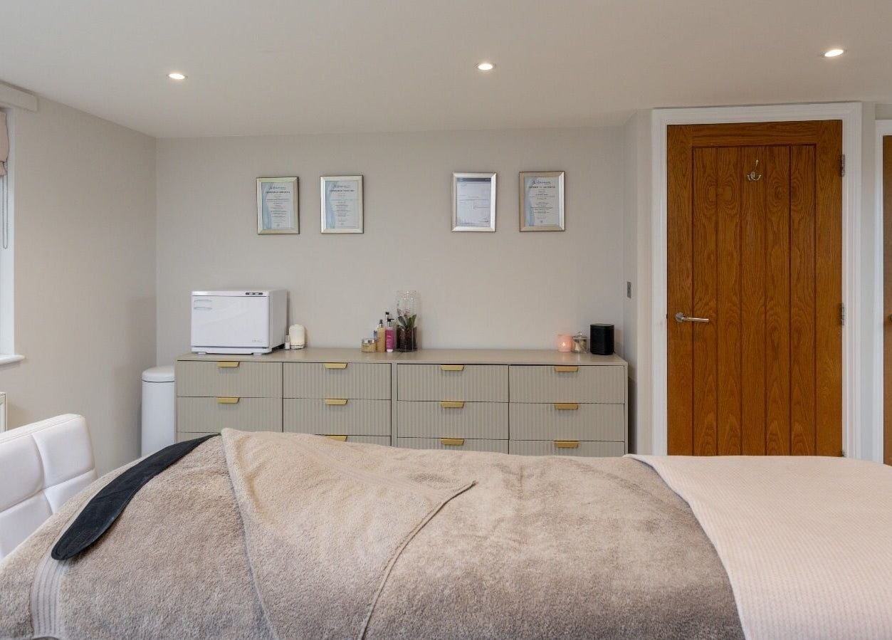 Serene treatment room at Skin Serenity, Bishopthorpe, England, GB, featuring a cozy massage table and calming decor.