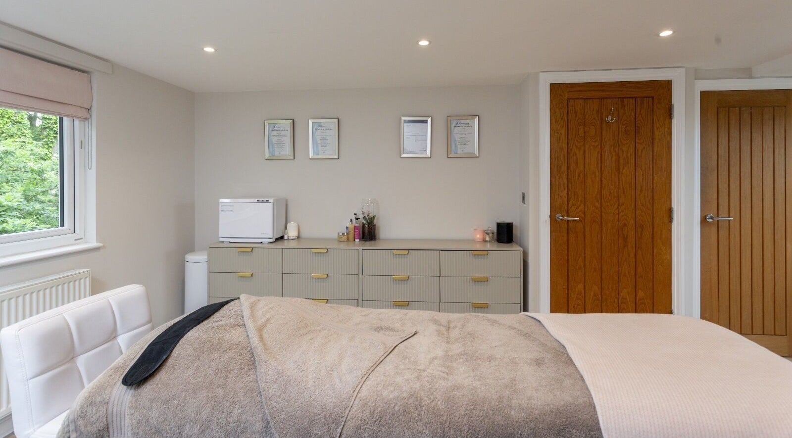 Serene treatment room at Skin Serenity, Bishopthorpe, England, GB, featuring a cozy massage table and calming decor.