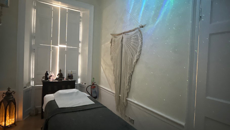 Peaceful therapy room at Touch Holistic Therapy, Edinburgh, Scotland, GB with calming decor and soft lighting.