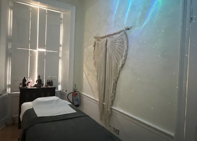 Peaceful therapy room at Touch Holistic Therapy, Edinburgh, Scotland, GB with calming decor and soft lighting.