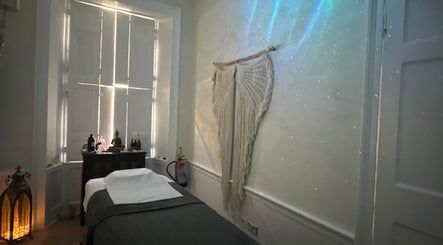 Peaceful therapy room at Touch Holistic Therapy, Edinburgh, Scotland, GB with calming decor and soft lighting.