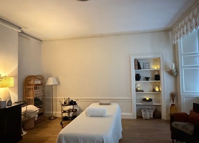 Serene massage room at Touch Holistic Therapy, Edinburgh, Scotland, GB, featuring elegant decor and calming ambiance.