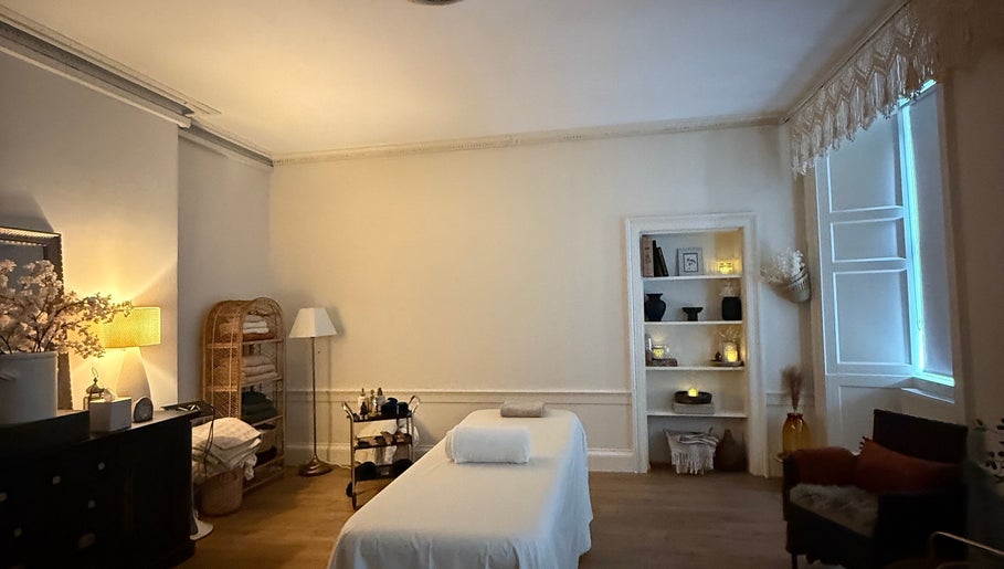 Tranquil therapy room at Touch Holistic Therapy in Edinburgh, Scotland, GB with calming decor and ambient lighting.