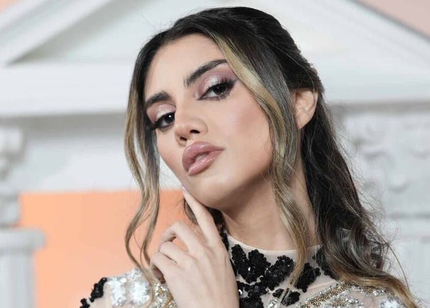 Elegant woman at Elie Farah Salon, Jal El Dib, Mount Lebanon Governorate, LB, showcasing stunning makeup.