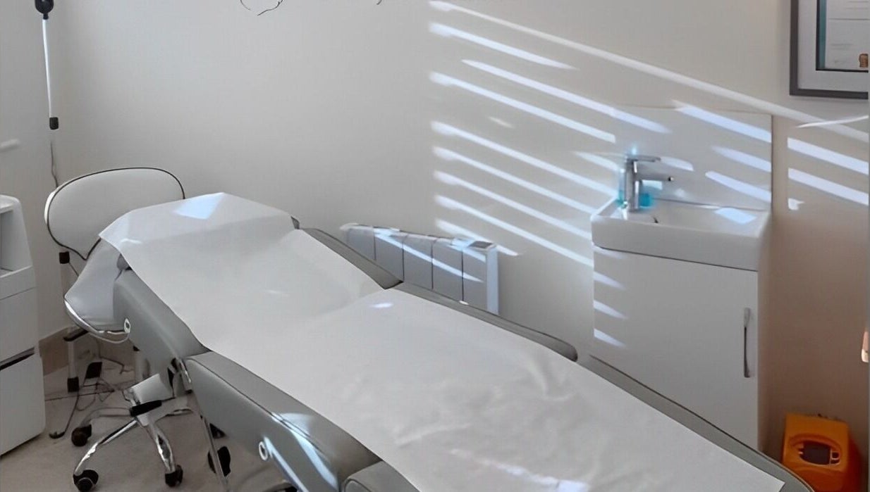 Spacious treatment room at Katie Mai Beauty & Aesthetics, Stevenage, England, GB featuring a comfortable bed.