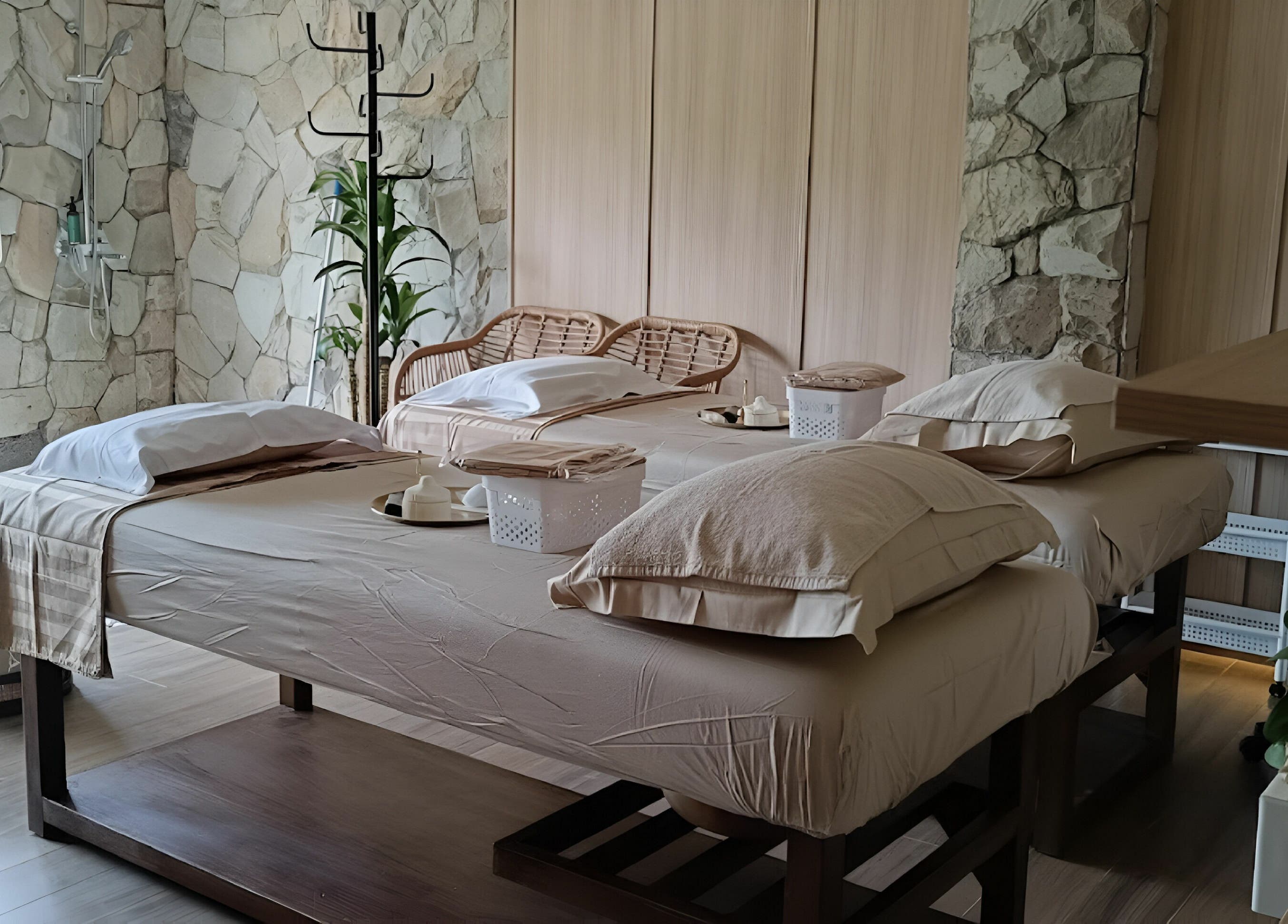 Luxurious massage room at Gaya Spa PIK, Banten, Banten, ID, featuring cozy twin beds with soothing decor.