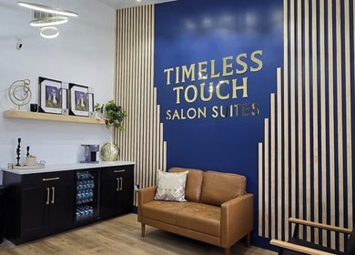 Elegant salon lobby at Kimberly’s Chair, New Port Richey, Florida, US, featuring modern decor and comfortable seating.