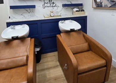 Luxurious shampoo chairs at Kimberly’s Chair in New Port Richey, Florida, US. Chic spa experience.