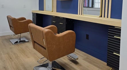 Stylish salon chairs at Kimberly’s Chair, New Port Richey, Florida, US, create a welcoming atmosphere.