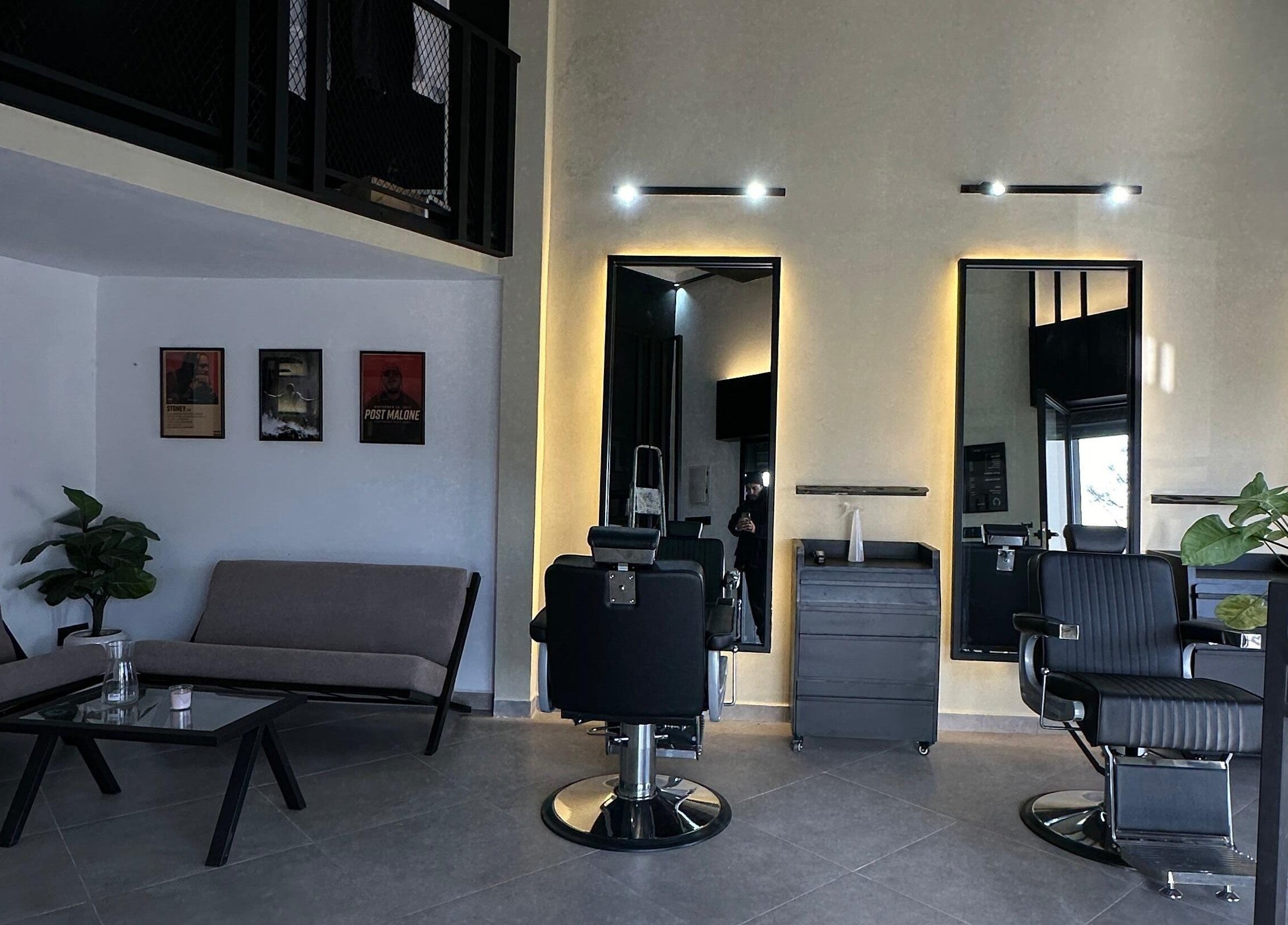 Chic interior of Soufian Allal in Tetouan, with stylish chairs and mirrors creating a relaxing ambiance.