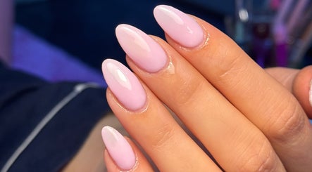 Elegant pink almond nails at MCR Beauty Room, Worsley, England, GB enhancing hand aesthetics.