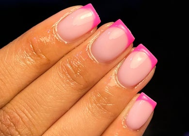 Close-up of vibrant pink manicure at MCR Beauty Room, Worsley, England, GB.