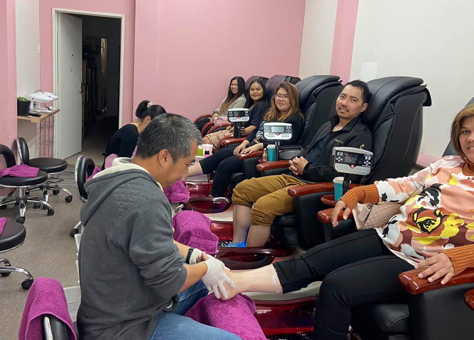 Customers enjoy a relaxing pedicure at Ruby Nails, Palmerston North, Manawatu-Wanganui, NZ.