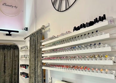 Nail polish display at Beauty by Laura Jayne, Tutbury, England, GB featuring diverse vibrant colors.
