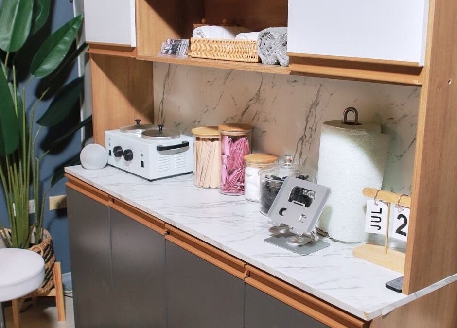 Organized beauty station at Sugar Bare Studio, Montego Bay, St. James Parish, JM, featuring chic decor.