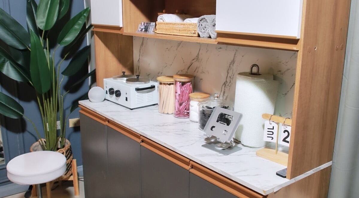 Organized beauty station at Sugar Bare Studio, Montego Bay, St. James Parish, JM, featuring chic decor.