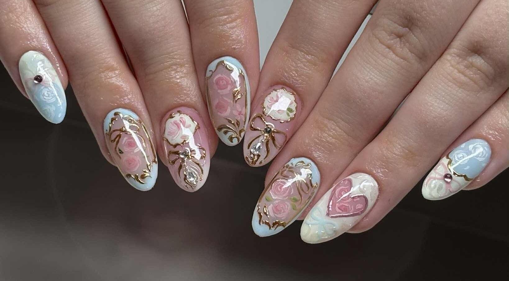 Elegant floral nail art at NailFrantasy (Stockton), located in Stockton-on-tees, England, GB.