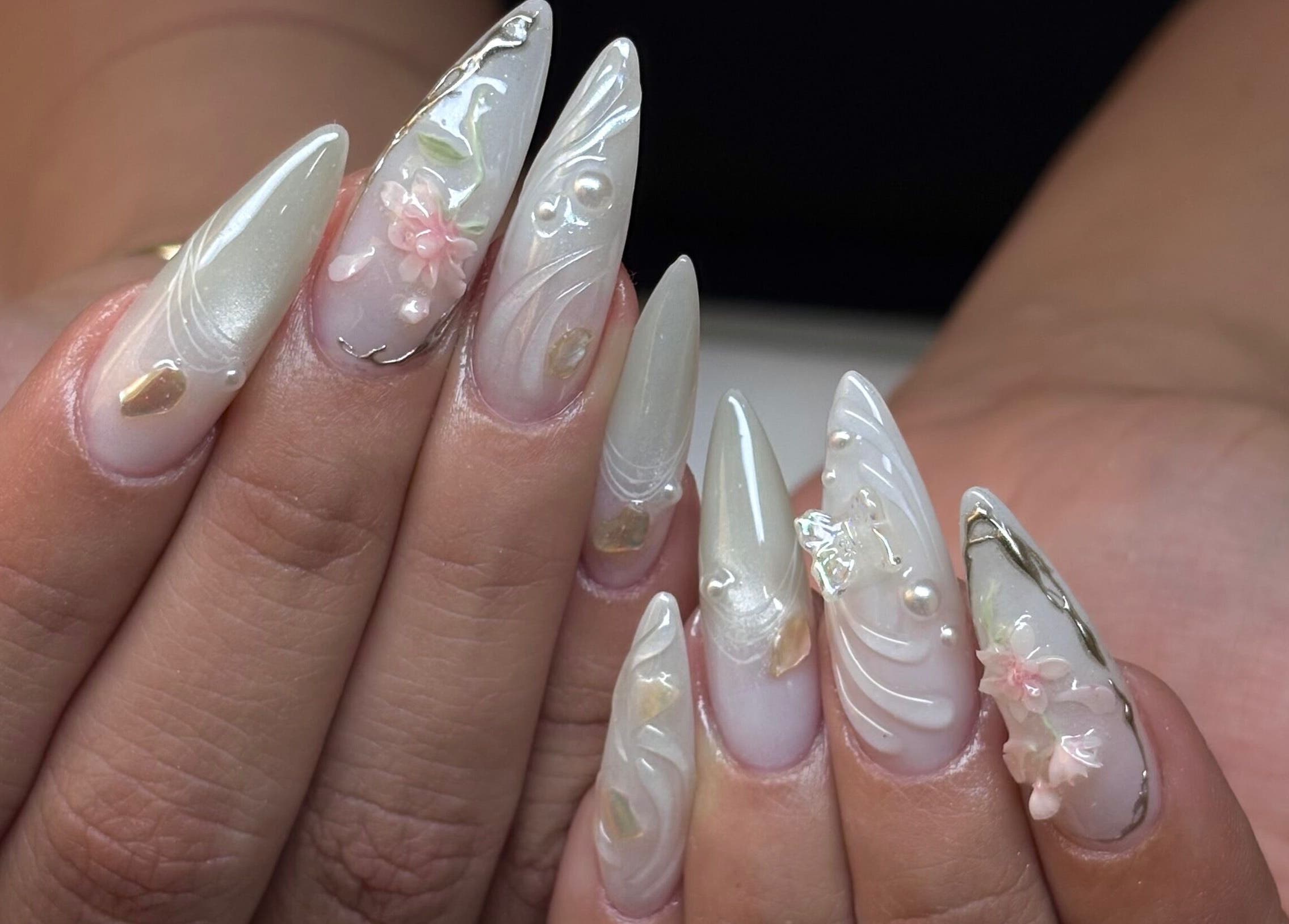 Elegant floral nail art at Nailfrantasy (Headkandy Middlesbrough), Coulby Newham, England, GB.