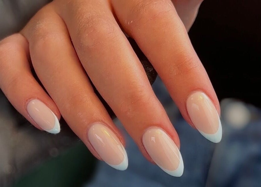Close-up of manicured nails with pastel tips at Shape Studios, Cardiff, Wales, GB.