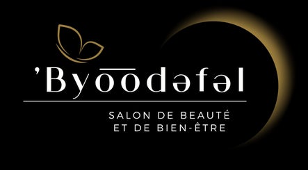 Elegant logo of ˈByo͞odəfəl.USA, a beauty salon in Baldwin, New York, US with a gold-accented design.