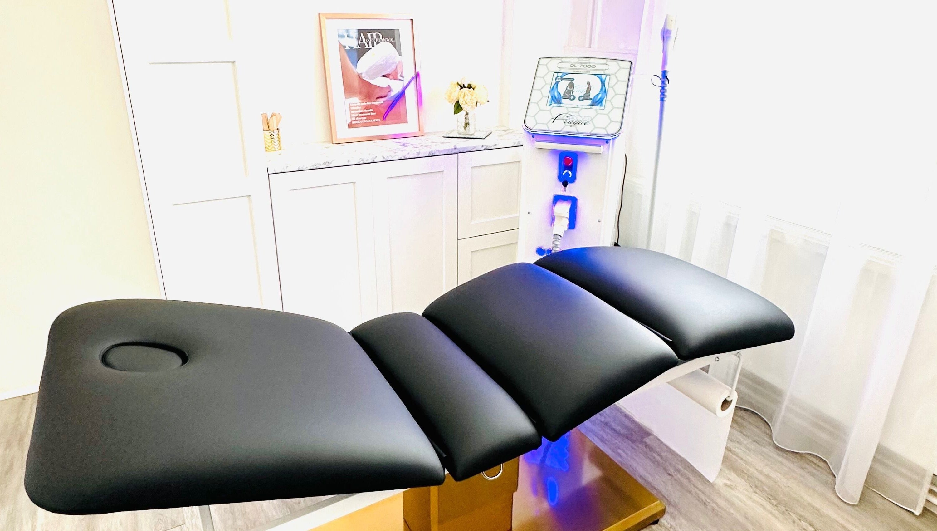 Modern treatment chair and equipment at MK Aesthetics Clinic, Derby, England, GB, offering premium beauty services.