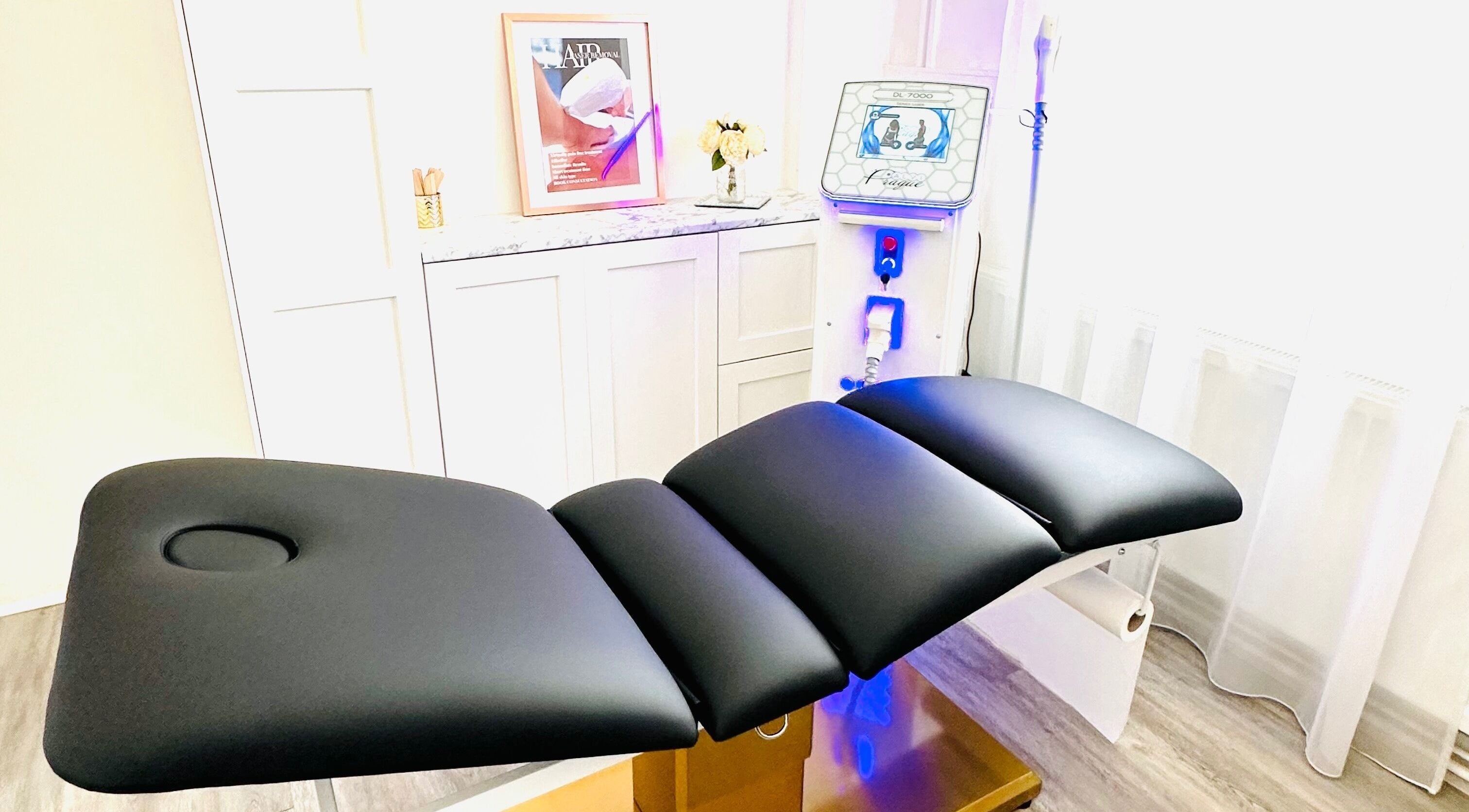 Modern treatment chair and equipment at MK Aesthetics Clinic, Derby, England, GB, offering premium beauty services.