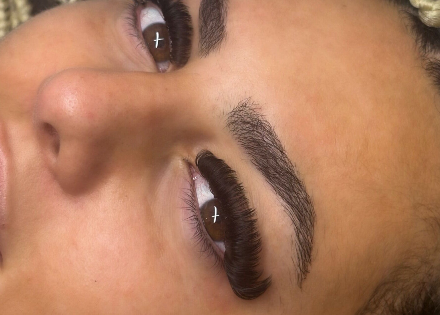 Close-up of expertly applied eyelash extensions at Ndlashes, Salford, England, GB.