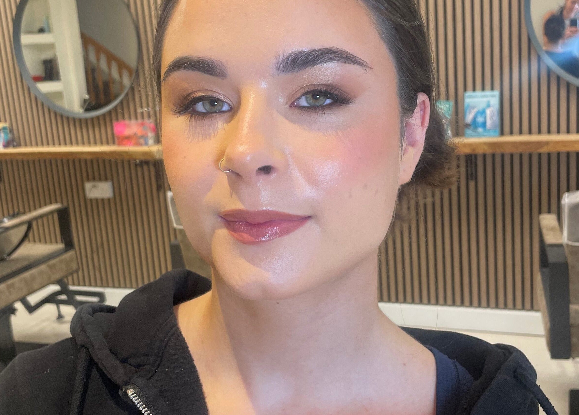 A client with luminous makeup at Lily Fitz MUA, Longford, County Longford, IE, showcasing beauty expertise.