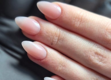 Close-up of elegant nude nails manicure at Simply Nails and Wellbeing, Crawley, England, GB.