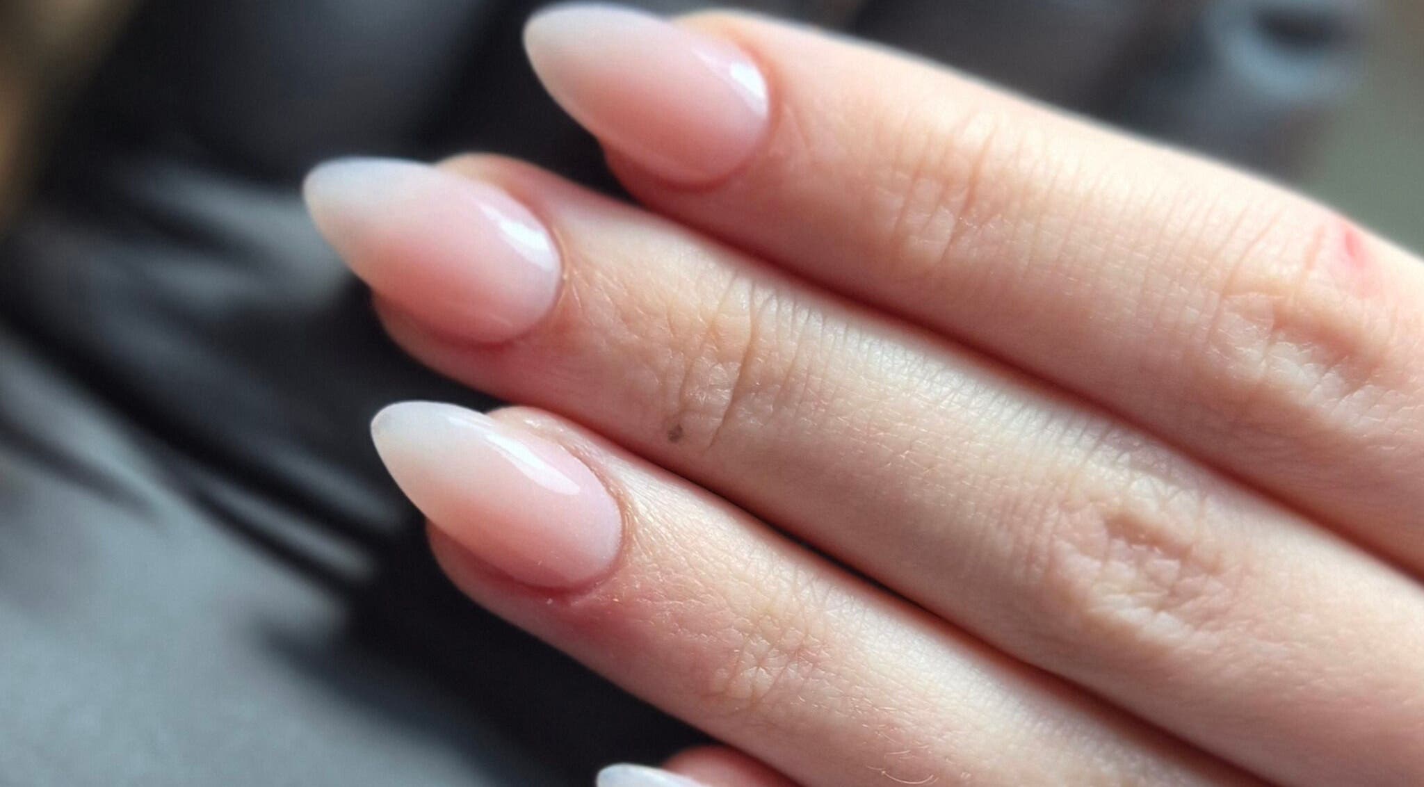 Close-up of elegant nude nails manicure at Simply Nails and Wellbeing, Crawley, England, GB.