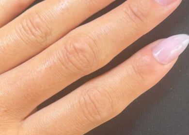 Beautiful manicure at Simply Nails and Wellbeing, Crawley, England, GB showcasing glossy nails.