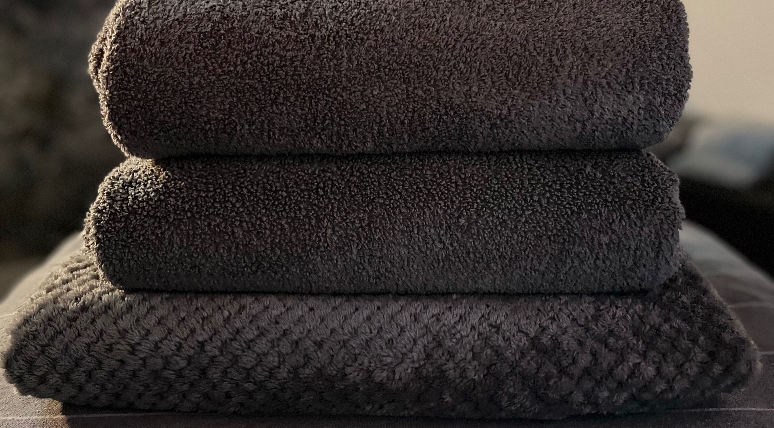 Plush black towels at Sports Massage with Paula, Llandudno Junction, Wales, GB.