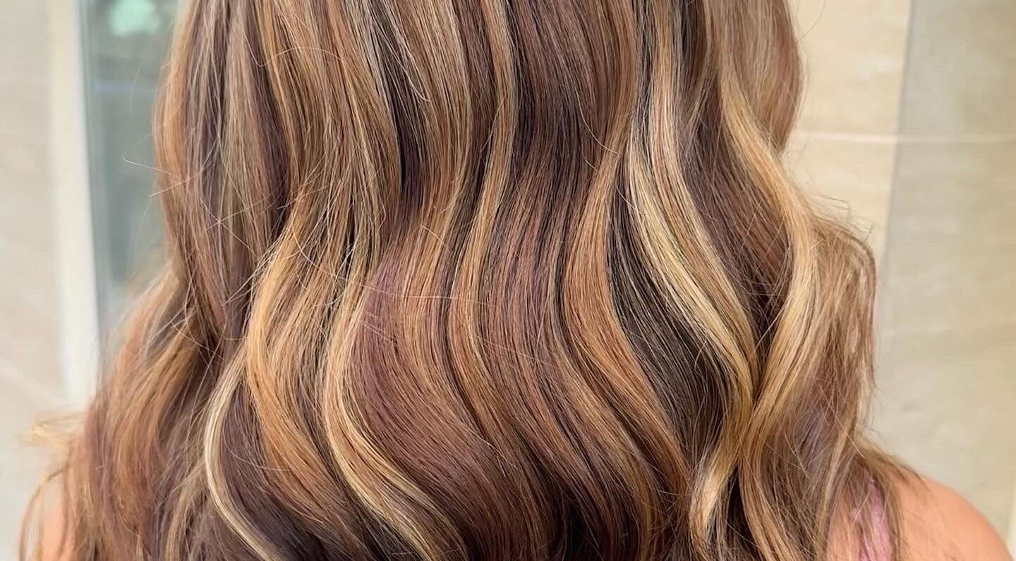 Beautifully styled wavy hair with highlights by Zoran Ducic in Tas-sliema, MT.