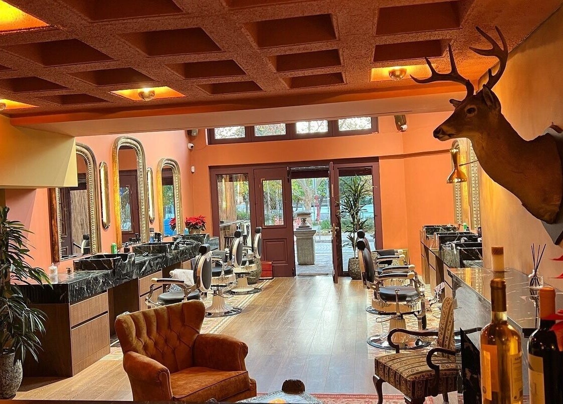 Luxurious interior of Hemingway Gentlemen’s Guild in Iraklio, Athens, GR with stylish decor and seating.