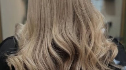Blonde wavy hairstyle from Hair Lounge With Ferne in Ash, England, GB, showcasing expert styling techniques.
