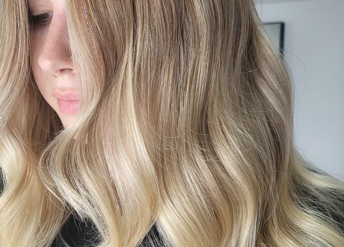 Elegant blonde waves styled at Luna & Co., Celbridge, County Kildare, IE, showcasing expert hair technique.