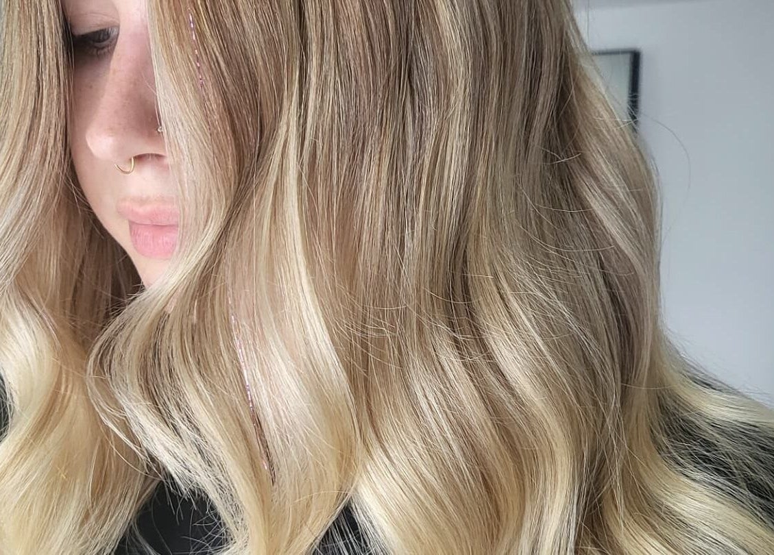 Elegant blonde waves styled at Luna & Co., Celbridge, County Kildare, IE, showcasing expert hair technique.