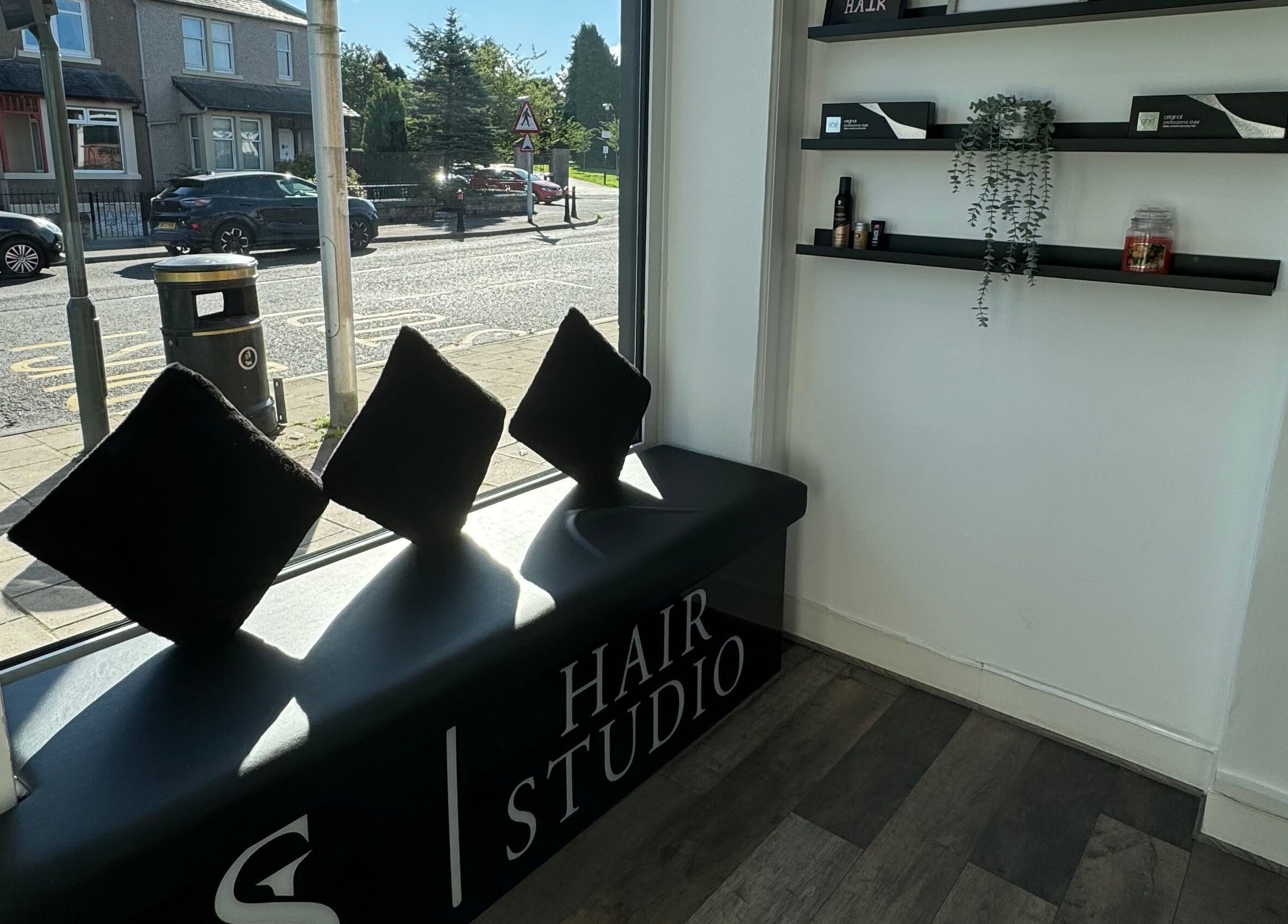 Cozy seating at S & L Hair Studio, Newtongrange, Scotland, GB with stylish interior decor.