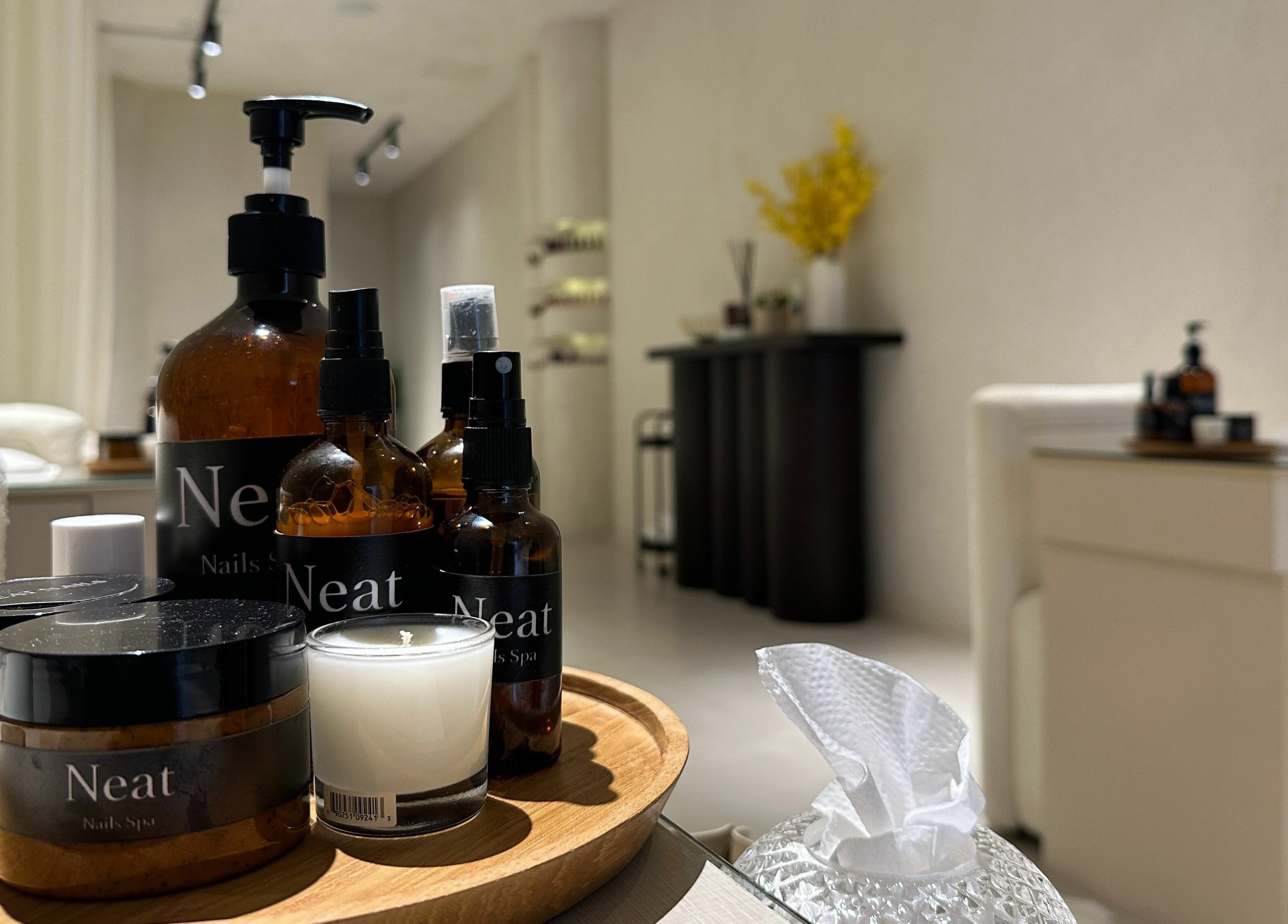 Neat Nails - صالون الأظافر المرتبة in Riyadh with skincare products and cozy ambiance.