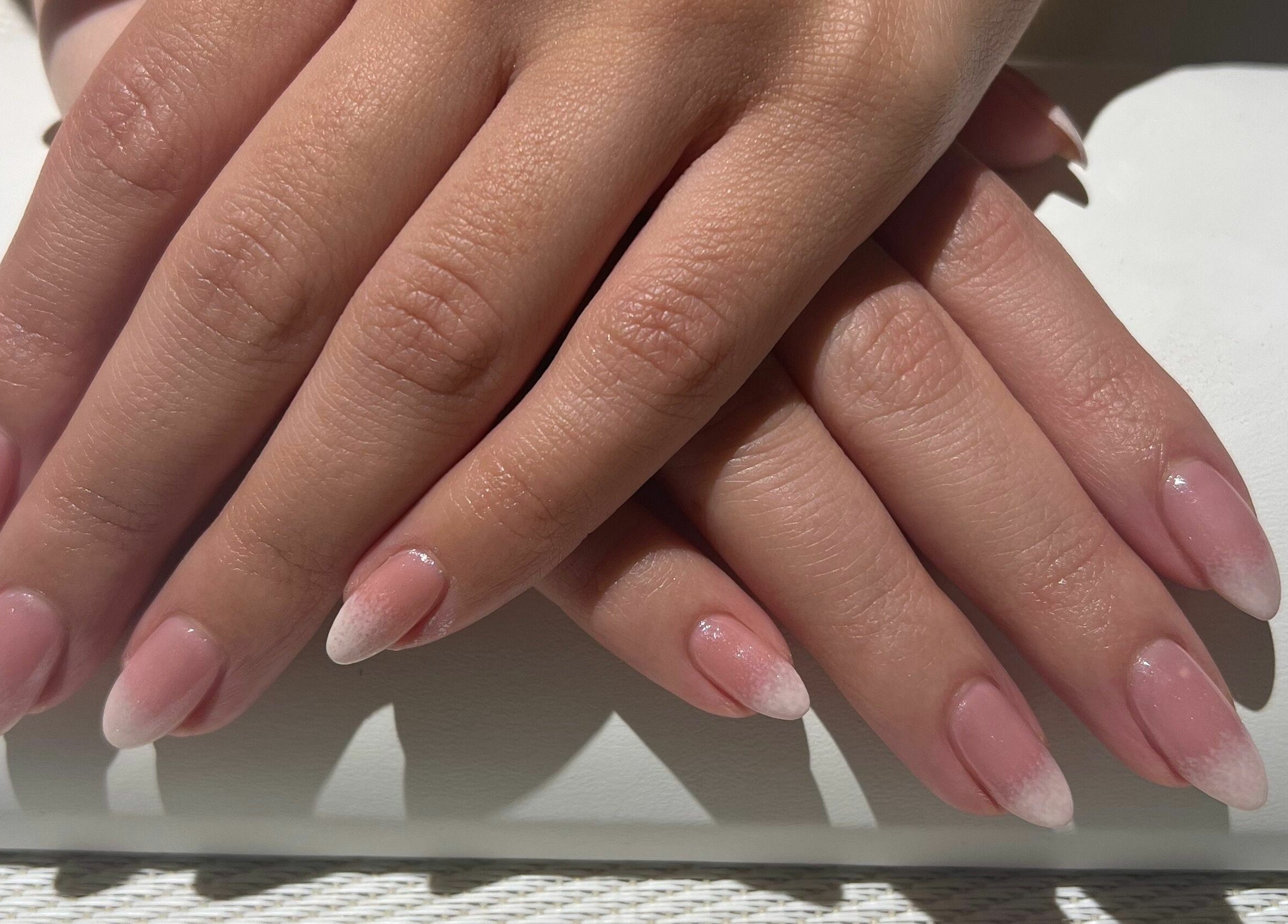Stylish pink ombre nails at Neat Nails - صالون الأظافر المرتبة in Riyadh, Riyadh Province, SA.