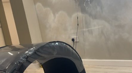 Elegant lash treatment area at lashesbydc in Leeds, England, GB, featuring a serene cloud mural.