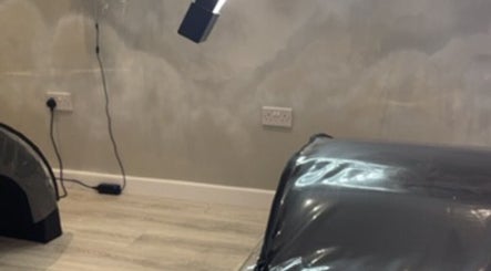 Modern treatment room at lashesbydc in Leeds, England, GB featuring comfy bed and stylish lighting.