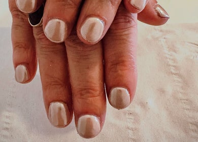 Manicured nails with shimmering polish at Sun Kissed Nail & Wax Studio, Thurso, Scotland, GB.